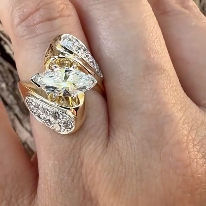 1.3ct Marquise-Cut Sapphire Engagement Ring with a Vintage Swirl Design