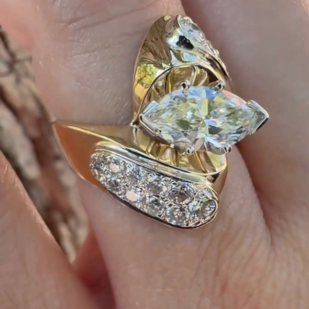 1.3ct Marquise-Cut Sapphire Engagement Ring with a Vintage Swirl Design
