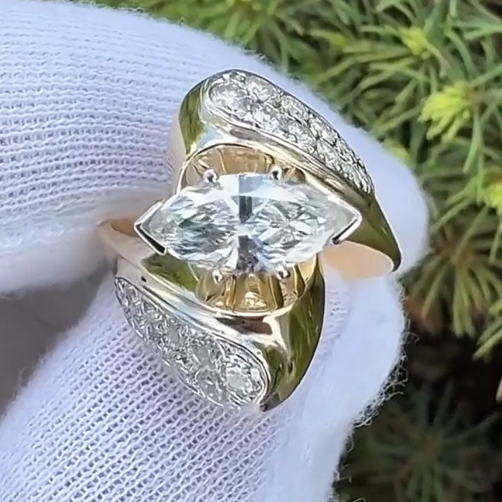 1.3ct Marquise-Cut Sapphire Engagement Ring with a Vintage Swirl Design